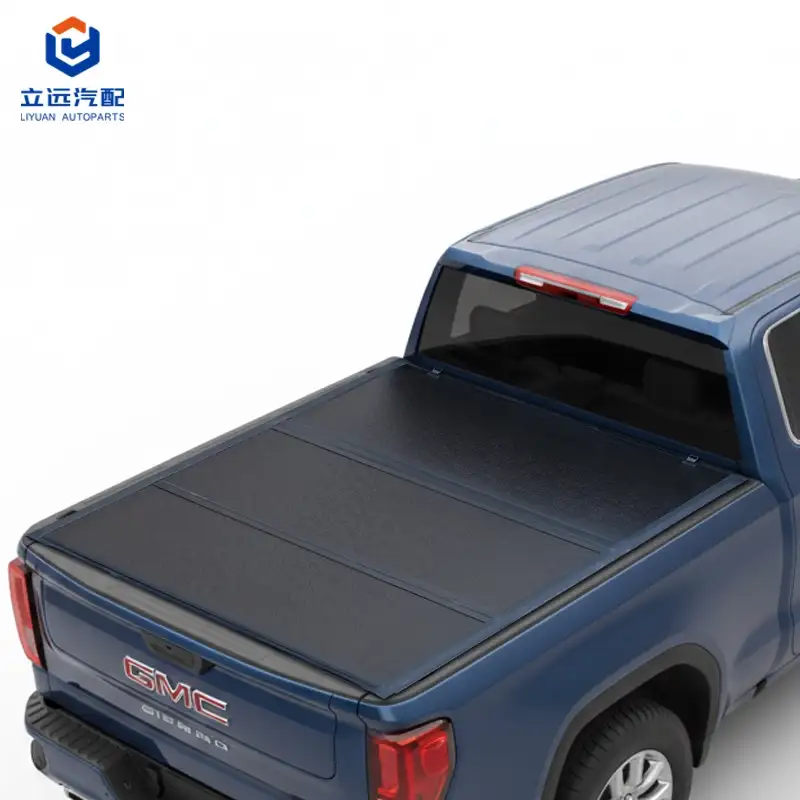 Žemo profilio kietas Tri-Fold Tonneau dangtelis, skirtas GMC